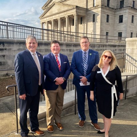 Biz Harris, Interim Executive Director of MELA, poses with Maury Hull (VP of HR at Hol-Mac), Ross Weems (First VP of BankPlus), and Representative Donnie Scoggin and Ross Weems,